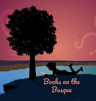 Girl reading by a tree